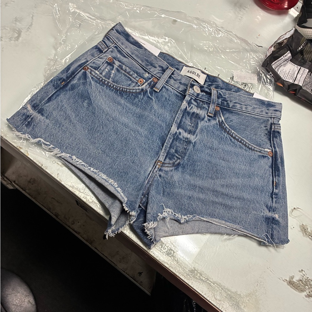 Agolde Light Blue Distressed Denim Cutoff Shorts